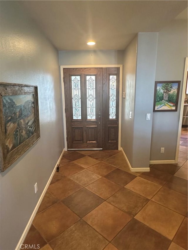 34300 Lantern Bay Dr Unit 41, Dana Point, CA 92629 - foyer with baseboards and tile patterned floors