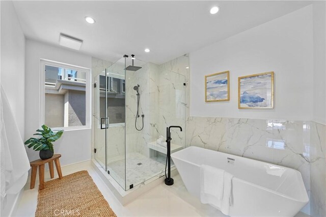 125 8th St, Huntington Beach, CA 92648 - bathroom featuring a marble finish shower, a soaking tub, recessed lighting, tile walls, and wainscoting