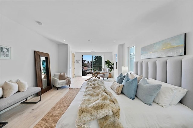 125 8th St, Huntington Beach, CA 92648 - bedroom with wood finished floors, access to exterior, and recessed lighting