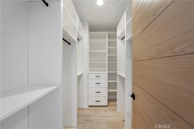 125 8th St, Huntington Beach, CA 92648 - spacious closet with wood finished floors