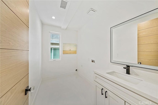 125 8th St, Huntington Beach, CA 92648 - bathroom with vanity, baseboards, and recessed lighting