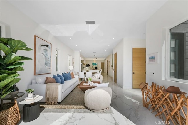 125 8th St, Huntington Beach, CA 92648 - living area featuring marble tiled floors and recessed lighting