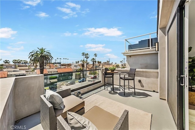 125 8th St, Huntington Beach, CA 92648 - view of patio / terrace with a balcony