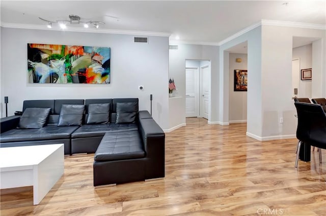 2230 Watermarke Pl, Irvine, CA 92612 - living area featuring light wood-style floors, ornamental molding, and baseboards