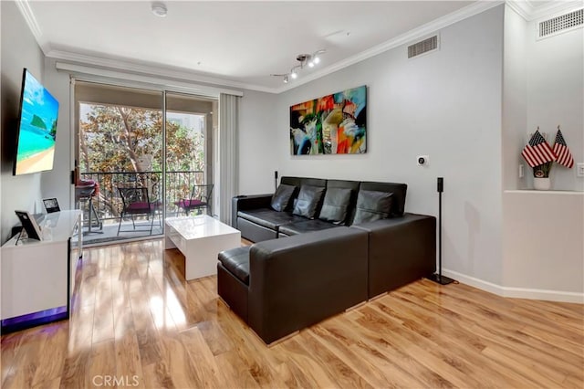 2230 Watermarke Pl, Irvine, CA 92612 - living room featuring light wood-style flooring, ornamental molding, baseboards, and track lighting