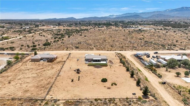 5824 White Fox Trl, Phelan, CA 92371 - aerial view of sparsely populated area featuring a desert landscape and mountains
