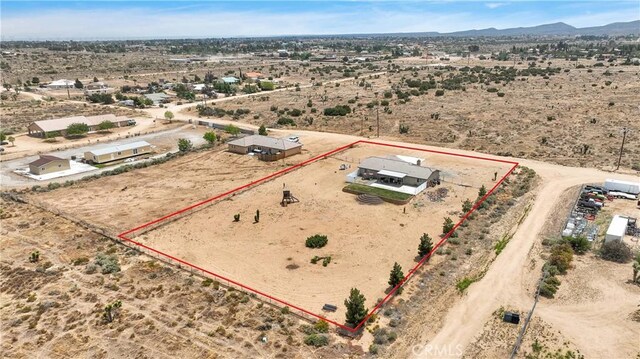 5824 White Fox Trl, Phelan, CA 92371 - view of rural area featuring a desert landscape, property parcel outlined, and mountains