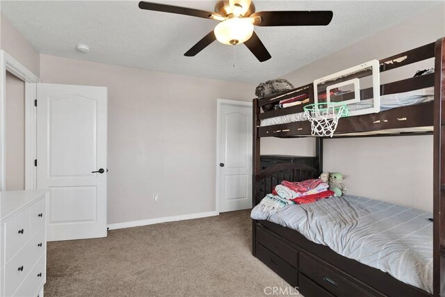 5824 White Fox Trl, Phelan, CA 92371 - bedroom featuring carpet, baseboards, and ceiling fan