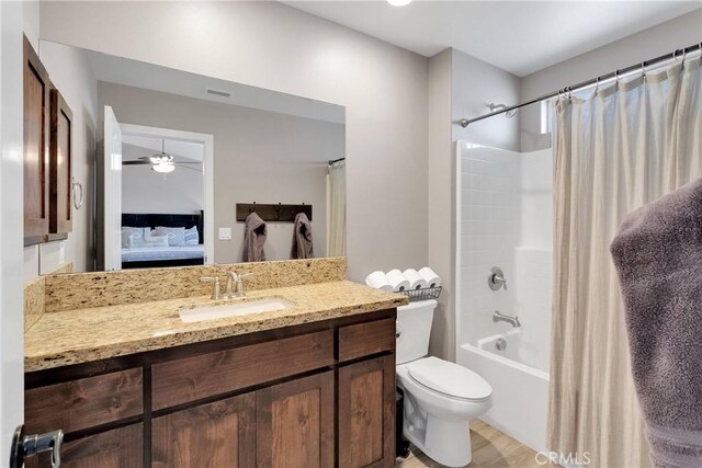 5824 White Fox Trl, Phelan, CA 92371 - ensuite bathroom with vanity, toilet, a ceiling fan, and shower / tub combo