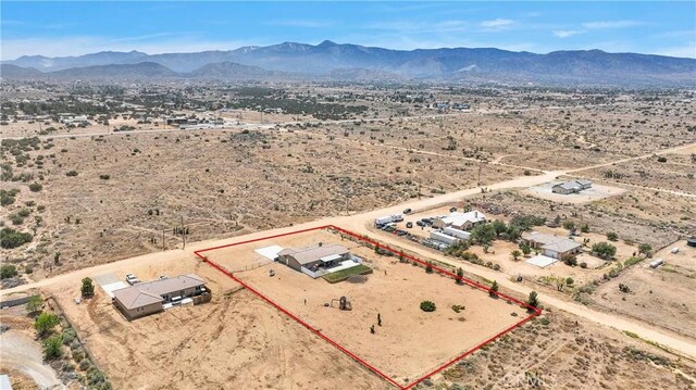 5824 White Fox Trl, Phelan, CA 92371 - view of rural area featuring a desert landscape, property parcel outlined, and a mountainous background