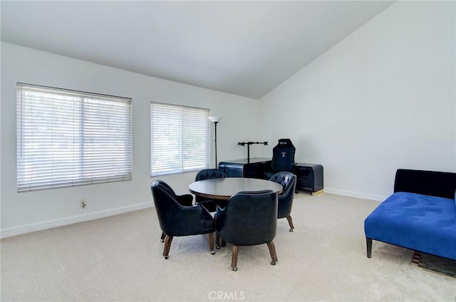 22492 Eloise Dr, Lake Forest, CA 92630 - dining area with light colored carpet, baseboards, and vaulted ceiling