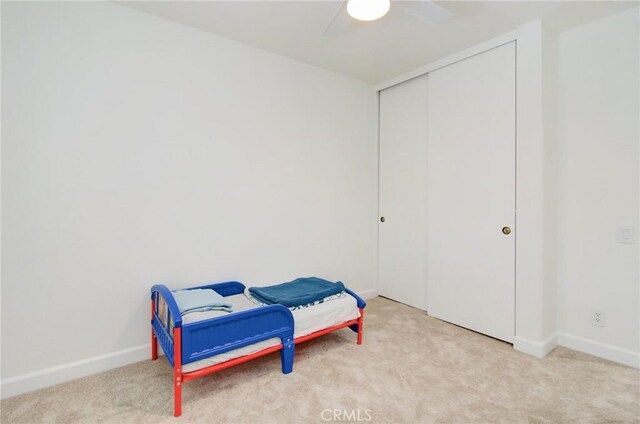 22492 Eloise Dr, Lake Forest, CA 92630 - carpeted bedroom featuring baseboards, a closet, and a ceiling fan