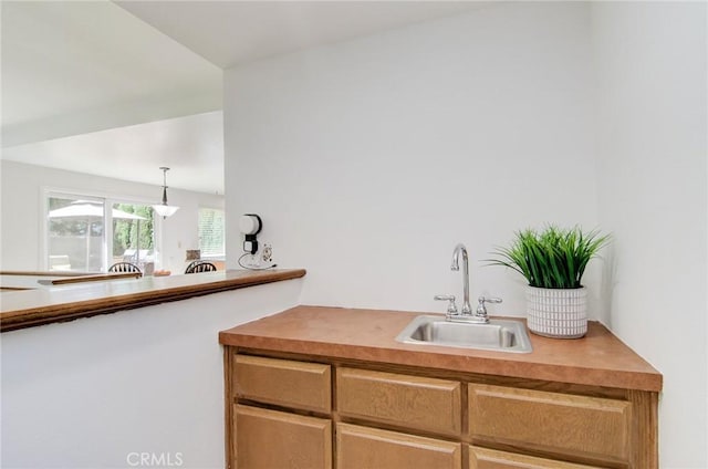22492 Eloise Dr, Lake Forest, CA 92630 - bar with a sink and hanging light fixtures