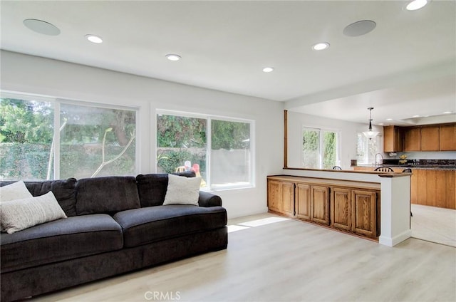 22492 Eloise Dr, Lake Forest, CA 92630 - living room featuring light wood-type flooring and recessed lighting