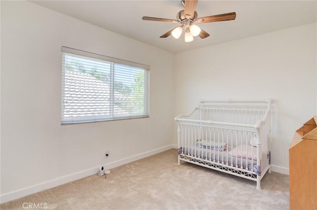 22492 Eloise Dr, Lake Forest, CA 92630 - bedroom featuring carpet flooring, baseboards, a ceiling fan, and a crib
