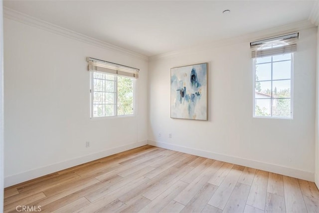 86 Canyoncrest, Irvine, CA 92603 - empty room with crown molding, baseboards, and hardwood / wood-style flooring