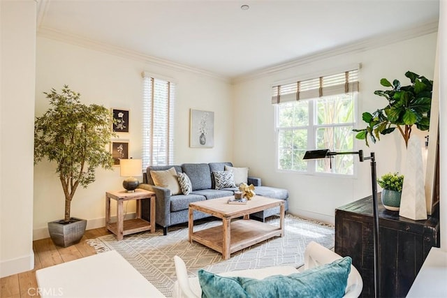 86 Canyoncrest, Irvine, CA 92603 - living room featuring plenty of natural light, ornamental molding, light wood-type flooring, and baseboards