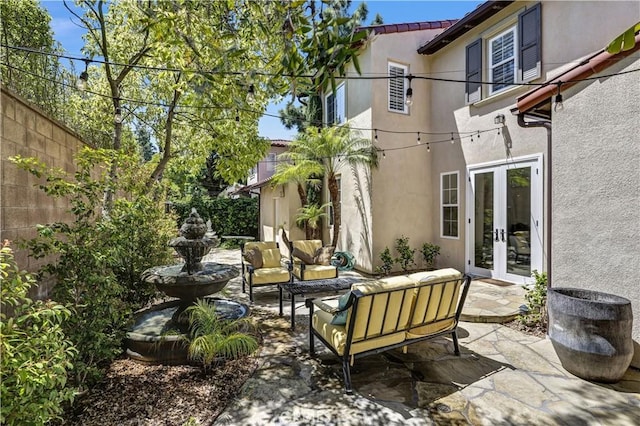 86 Canyoncrest, Irvine, CA 92603 - view of patio / terrace with french doors, fence, and an outdoor hangout area