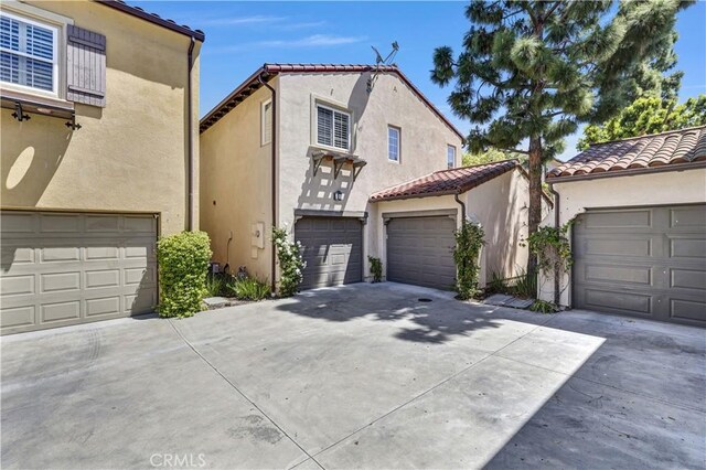 86 Canyoncrest, Irvine, CA 92603 - mediterranean / spanish-style home with stucco siding and a tiled roof