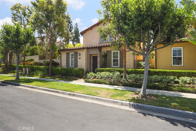 86 Canyoncrest, Irvine, CA 92603 - mediterranean / spanish-style house with stucco siding and a tile roof