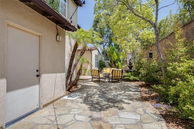 86 Canyoncrest, Irvine, CA 92603 - view of patio / terrace featuring fence