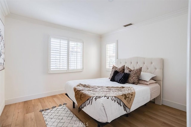 86 Canyoncrest, Irvine, CA 92603 - bedroom with crown molding, wood-type flooring, and baseboards