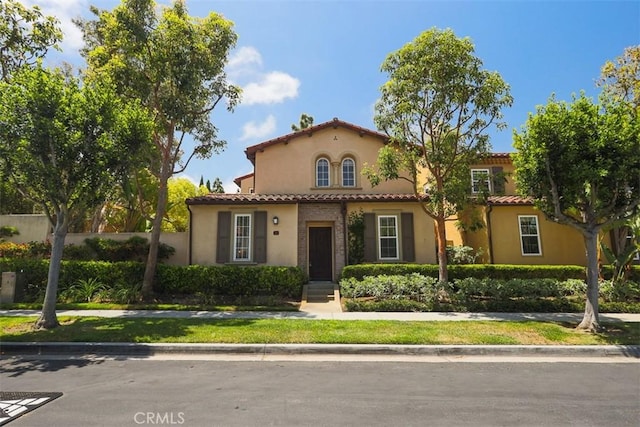 86 Canyoncrest, Irvine, CA 92603 - mediterranean / spanish house with stucco siding and a tiled roof