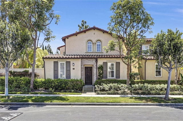 86 Canyoncrest, Irvine, CA 92603 - mediterranean / spanish house with stucco siding and a tiled roof