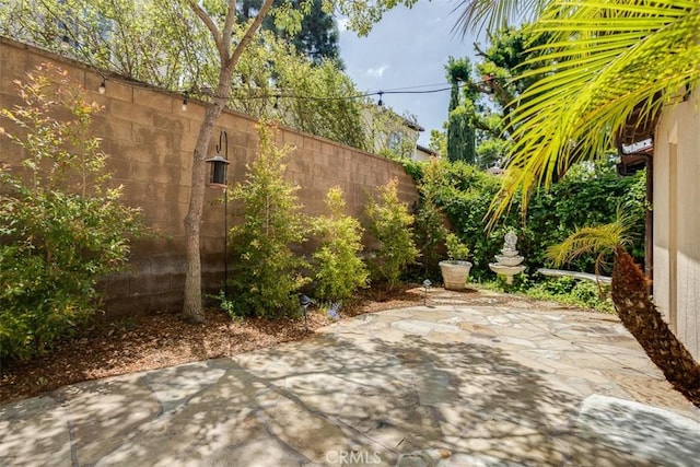 86 Canyoncrest, Irvine, CA 92603 - view of patio featuring a fenced backyard