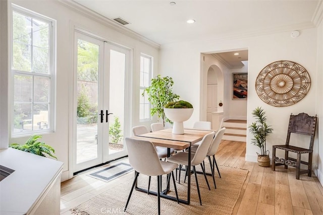 86 Canyoncrest, Irvine, CA 92603 - dining room with ornamental molding, french doors, light wood-style flooring, stairway, and recessed lighting