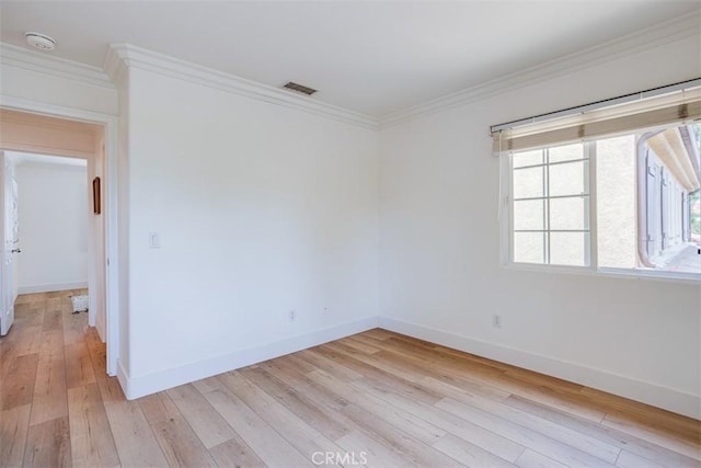 86 Canyoncrest, Irvine, CA 92603 - spare room with light wood-type flooring, a smoke detector, baseboards, and ornamental molding