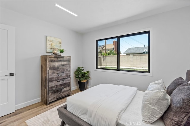 6341 Cerulean Ave, Garden Grove, CA 92845 - bedroom with light wood finished floors and baseboards