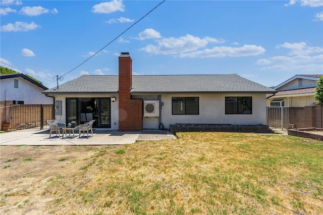 6341 Cerulean Ave, Garden Grove, CA 92845 - back of property featuring a patio area, a chimney, and stucco siding