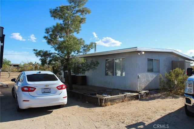 3776 Warren Vista Ave, Yucca Valley, CA 92284 - view of home's exterior featuring stucco siding