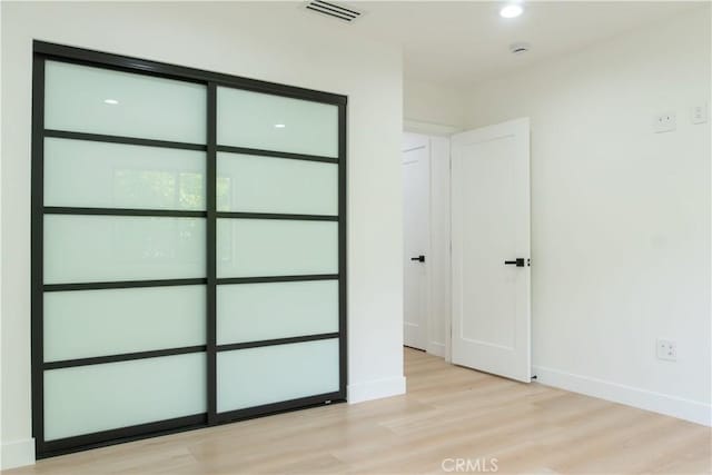 539 Avon Ave, Pasadena, CA 91105 - unfurnished bedroom featuring light wood-type flooring, baseboards, and recessed lighting