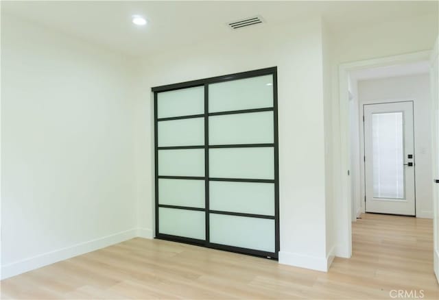 539 Avon Ave, Pasadena, CA 91105 - unfurnished bedroom featuring light wood-style flooring, baseboards, and recessed lighting