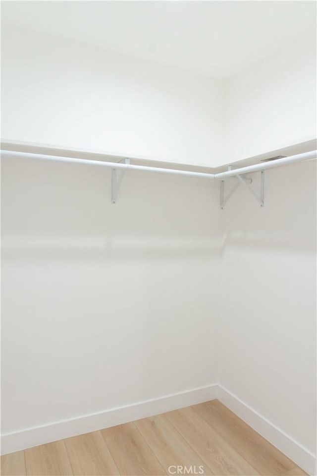 539 Avon Ave, Pasadena, CA 91105 - walk in closet featuring light wood finished floors