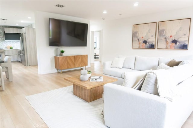 539 Avon Ave, Pasadena, CA 91105 - living area featuring light wood-style floors and recessed lighting