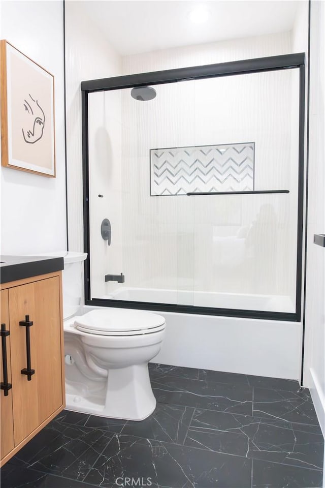 539 Avon Ave, Pasadena, CA 91105 - bathroom featuring marble finish floors, toilet, shower / bath combination with glass door, and vanity