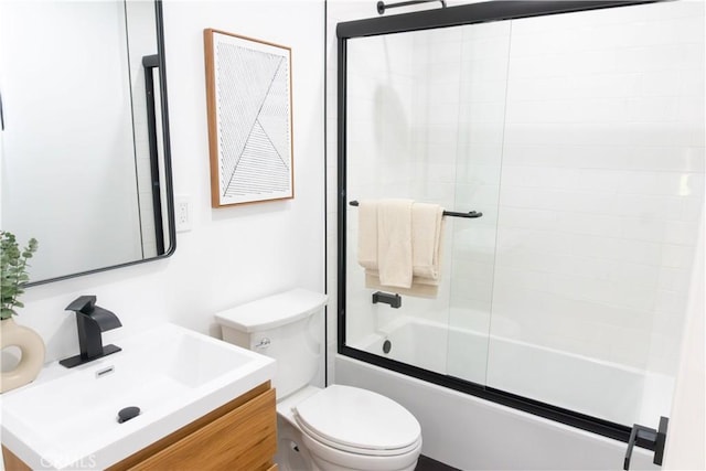 539 Avon Ave, Pasadena, CA 91105 - bathroom featuring toilet, bath / shower combo with glass door, and vanity