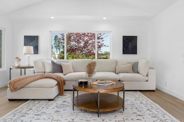 8184 Flanders Dr, San Diego, CA 92126 - living room with vaulted ceiling, wood finished floors, recessed lighting, and baseboards
