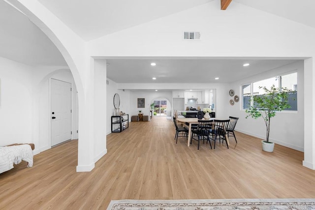 8184 Flanders Dr, San Diego, CA 92126 - dining room with light wood-style flooring, baseboards, arched walkways, and recessed lighting