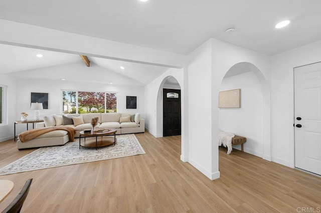 8184 Flanders Dr, San Diego, CA 92126 - living area featuring arched walkways, light wood-style flooring, baseboards, and recessed lighting
