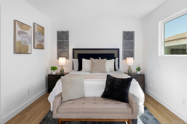 8184 Flanders Dr, San Diego, CA 92126 - bedroom featuring wood finished floors and baseboards