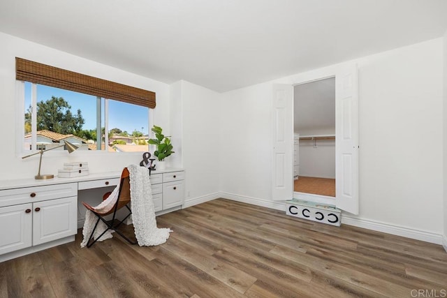 1707 Willowhaven Rd, Encinitas, CA 92024 - unfurnished office featuring dark wood-style flooring, baseboards, and built in study area
