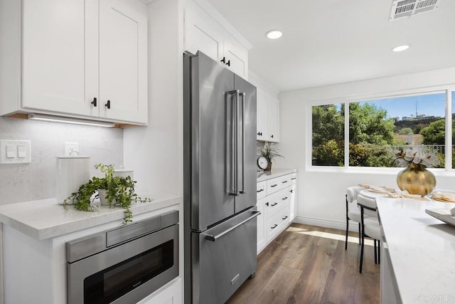 1707 Willowhaven Rd, Encinitas, CA 92024 - kitchen featuring stainless steel appliances, dark wood finished floors, white cabinetry, recessed lighting, and baseboards