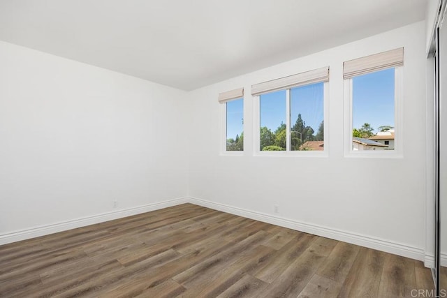 1707 Willowhaven Rd, Encinitas, CA 92024 - spare room with baseboards and wood finished floors