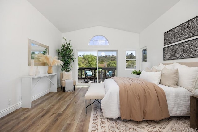 1707 Willowhaven Rd, Encinitas, CA 92024 - bedroom featuring access to exterior, wood finished floors, high vaulted ceiling, and baseboards
