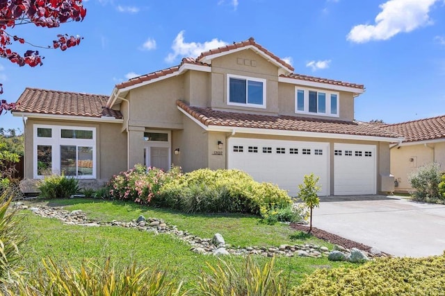 1707 Willowhaven Rd, Encinitas, CA 92024 - view of front facade with a tile roof, driveway, stucco siding, a garage, and a front yard