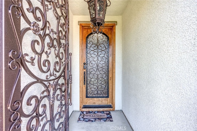 5801 S Moonstone Peak Dr, Bakersfield, CA 93313 - property entrance featuring stucco siding
